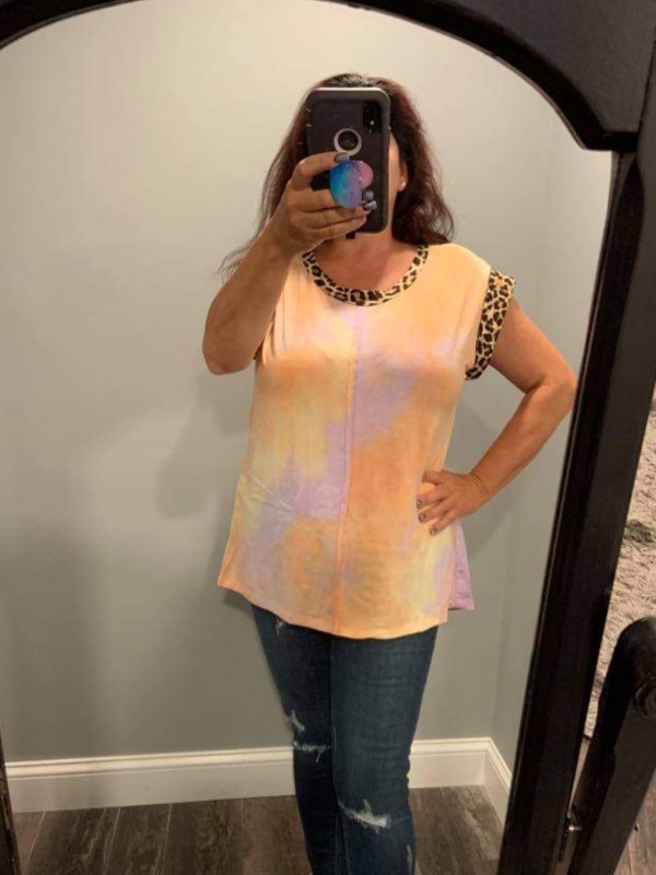 A short sleeve tie dye knit top with a round neck featuring a leopard print trim detail - Peach Supply