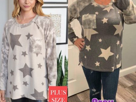 PLUS Long sleeve star print knit top with a round neck featuring a tie dye patch pocket, tie dye trim, and a side slit - Grey or Taupe Supply